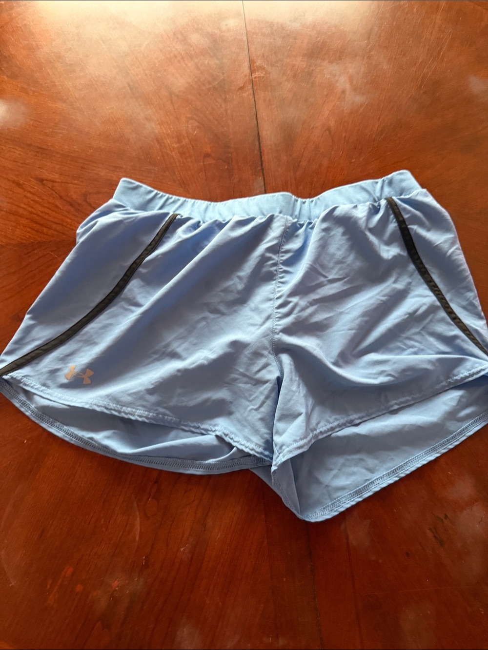 Under Armour Women's Sky Blue Athletic Shorts with Black Trim
